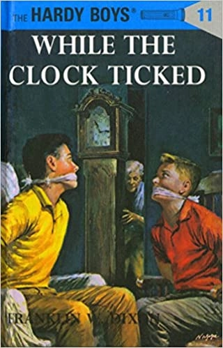 While the Clock Ticked (Hardy Boys, Book 11) 